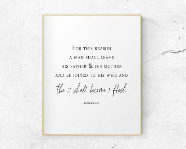 Ephesians 5:31 black and white bible verse wall art. black font on white background. the words "two shall become 1 flesh" are highlighted in a larger script font